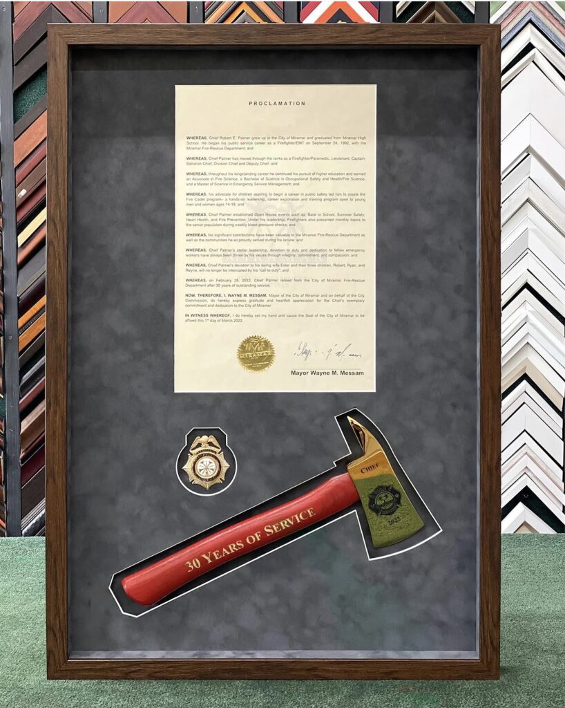 Custom shadow box framing firefighter service award and memorabilia