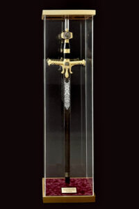 Custom shadow box in Pembroke Pines showcasing a ceremonial sword with museum-quality framing by Art Frame Decor.