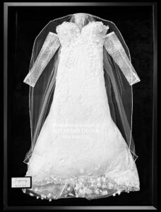 Custom wedding dress shadow box framing in Pembroke Pines by Art Frame Decor.
